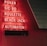 Red neon letters are mounted on a dark tiled wall, displaying the words Poker, Sic Bo, Roulette, Black Jack, and Automaten.